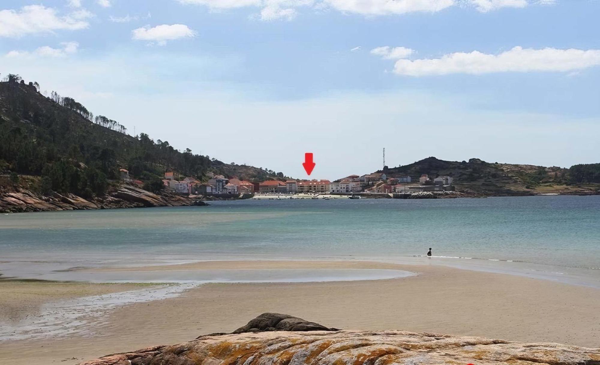 Appartamento Acogedor ático a pie de mar y montaña. O Pindo Esterno foto